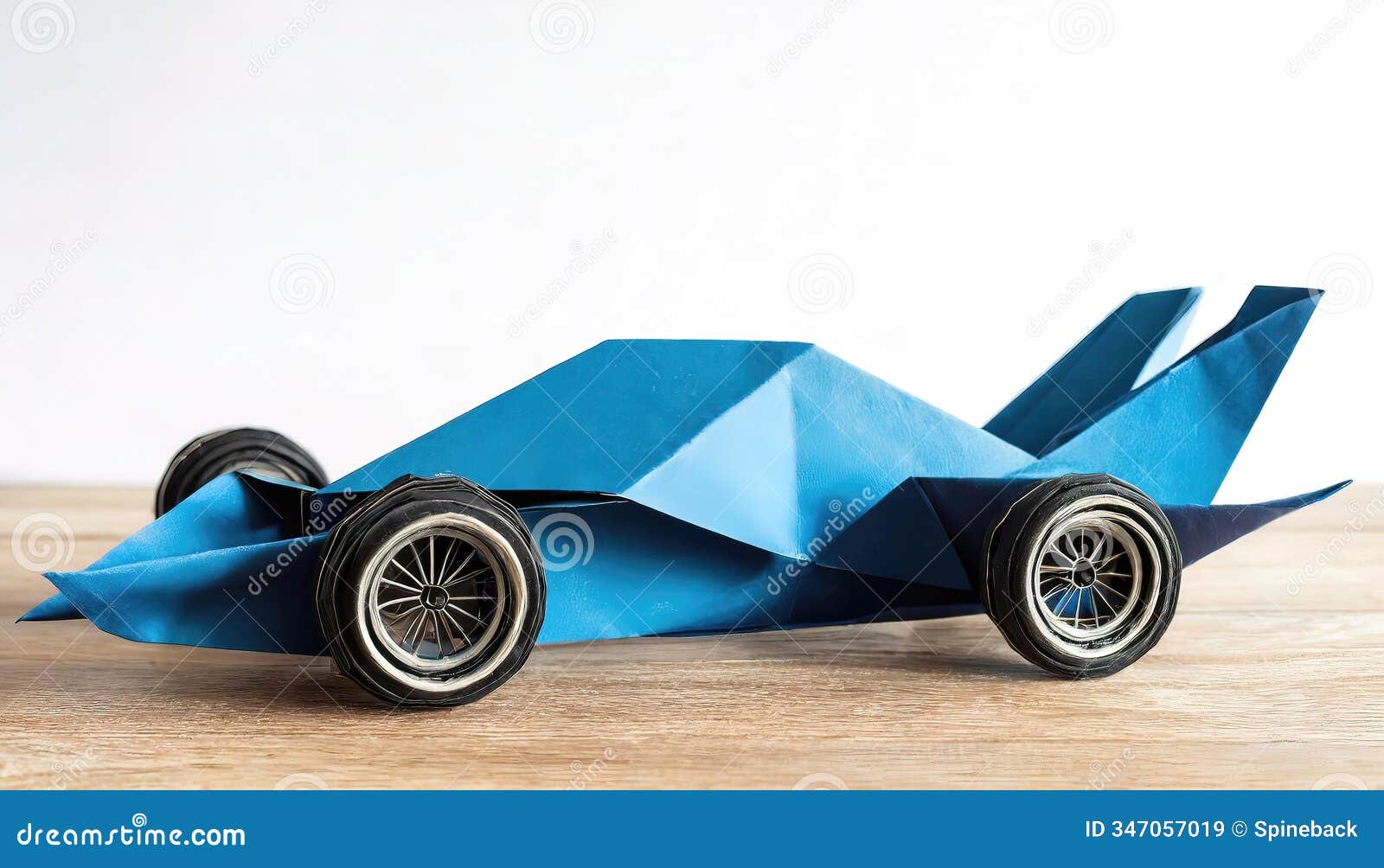 paper origami concept of a formula one f1 racing car, a single seat, open cockpit, open wheel vehicle ed to experience peak