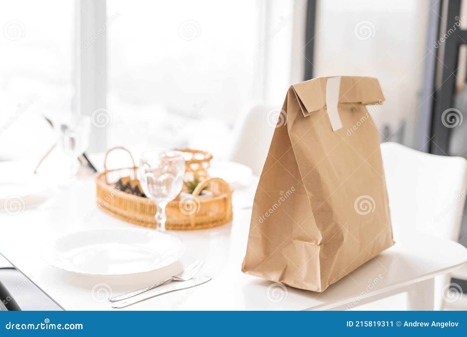 Paper Packages with Groceries on Kitchen Table Stock Image Image of