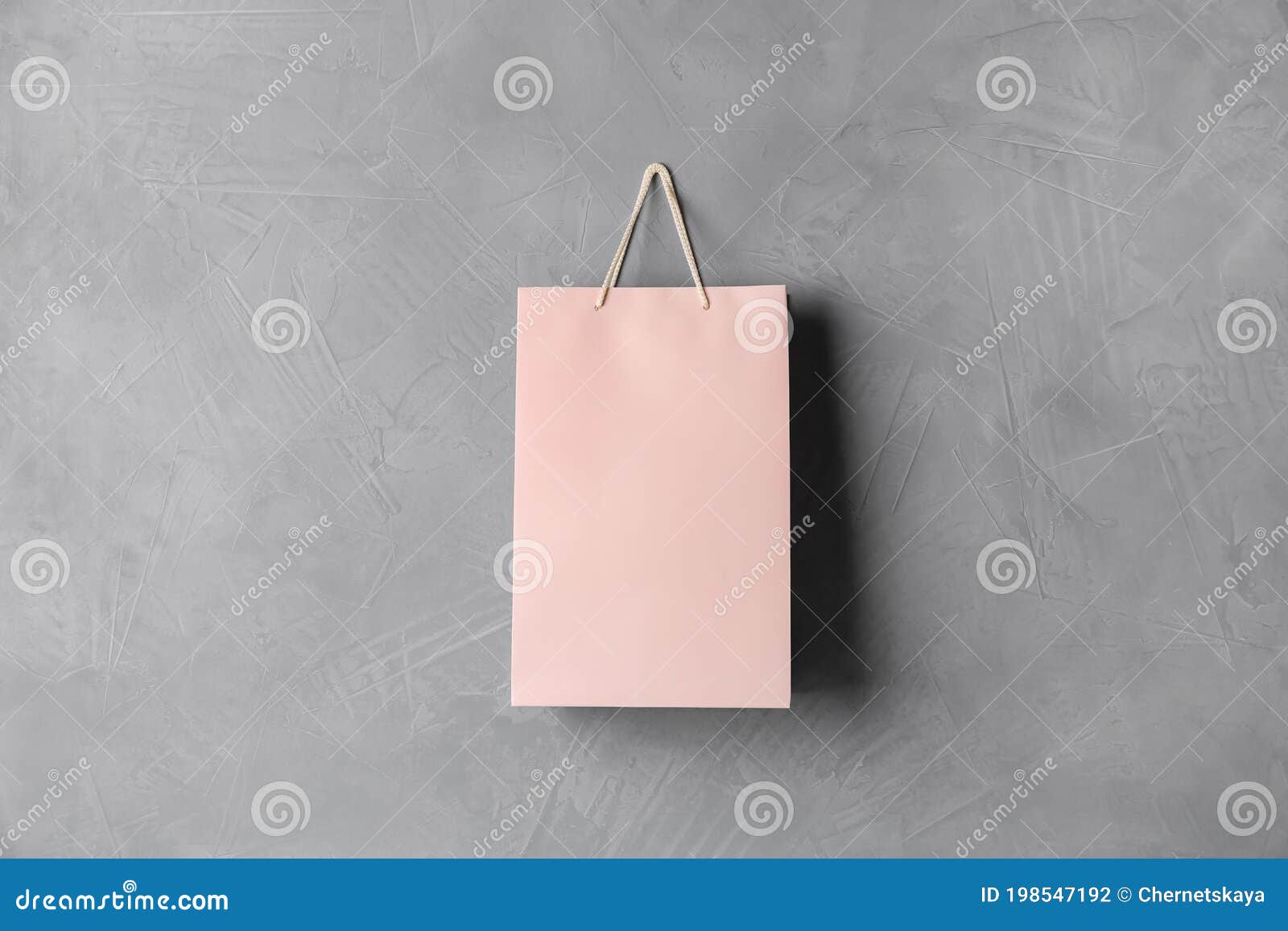 Paper Shopping Bag Hanging on Grey Stock Photo Image of gift, bargain