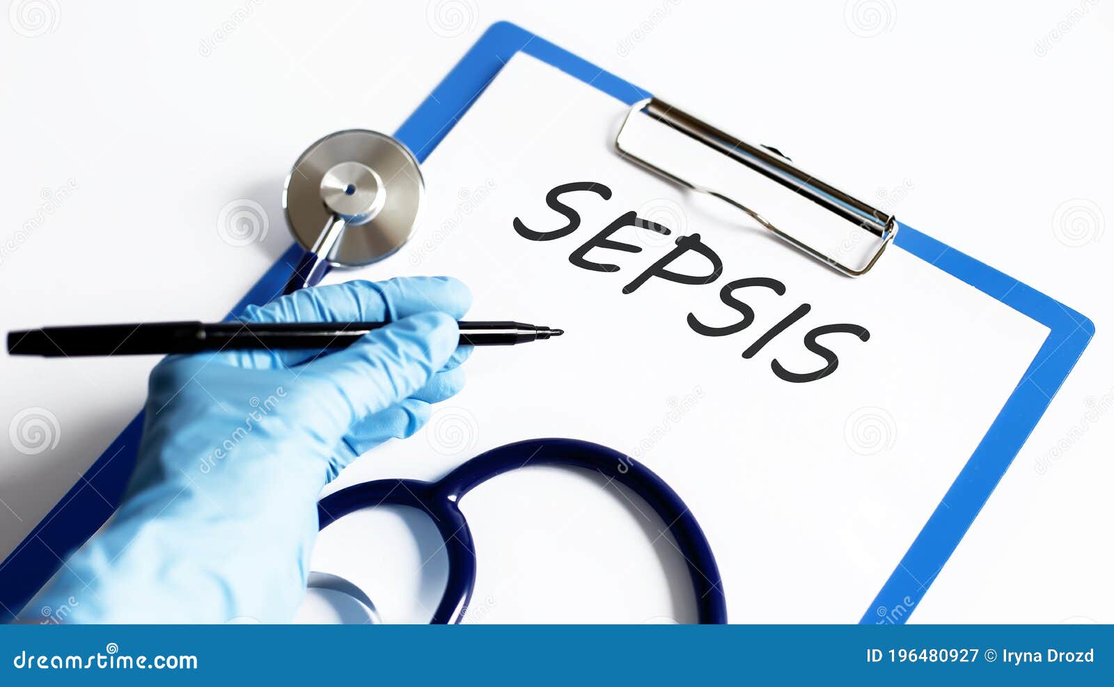 paper with text sepsis on a table with stethoscope