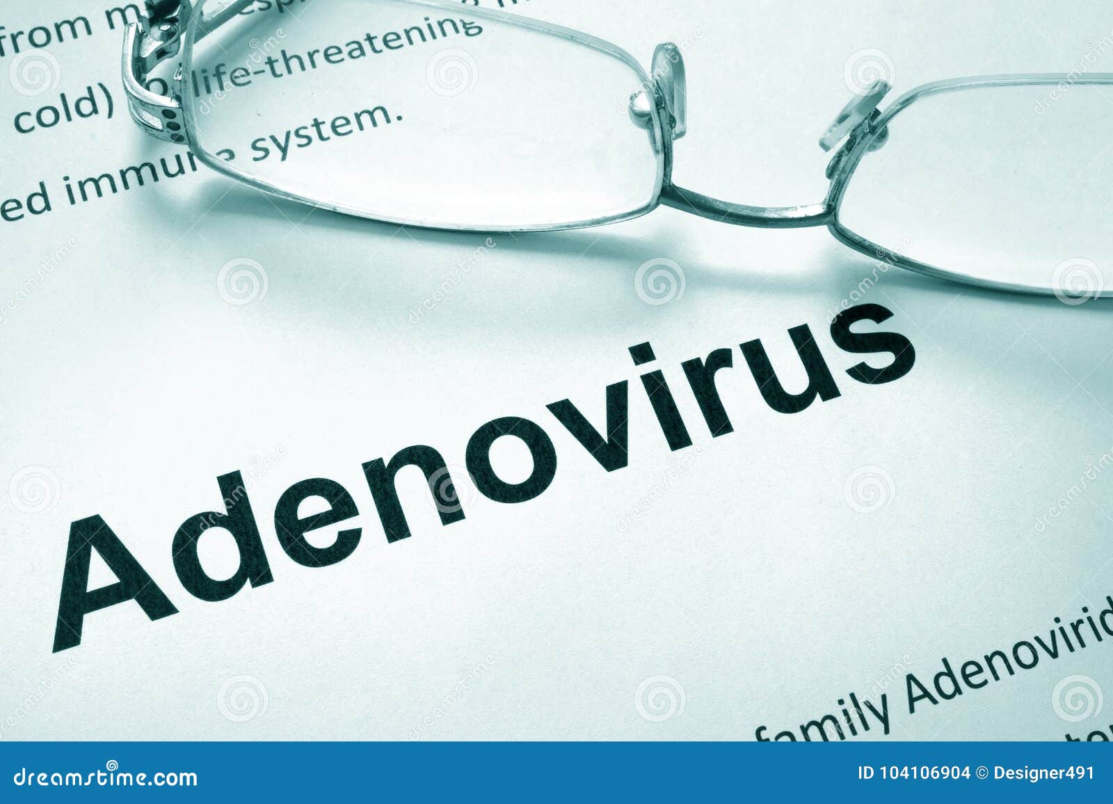 paper with word adenovirus and glasses.
