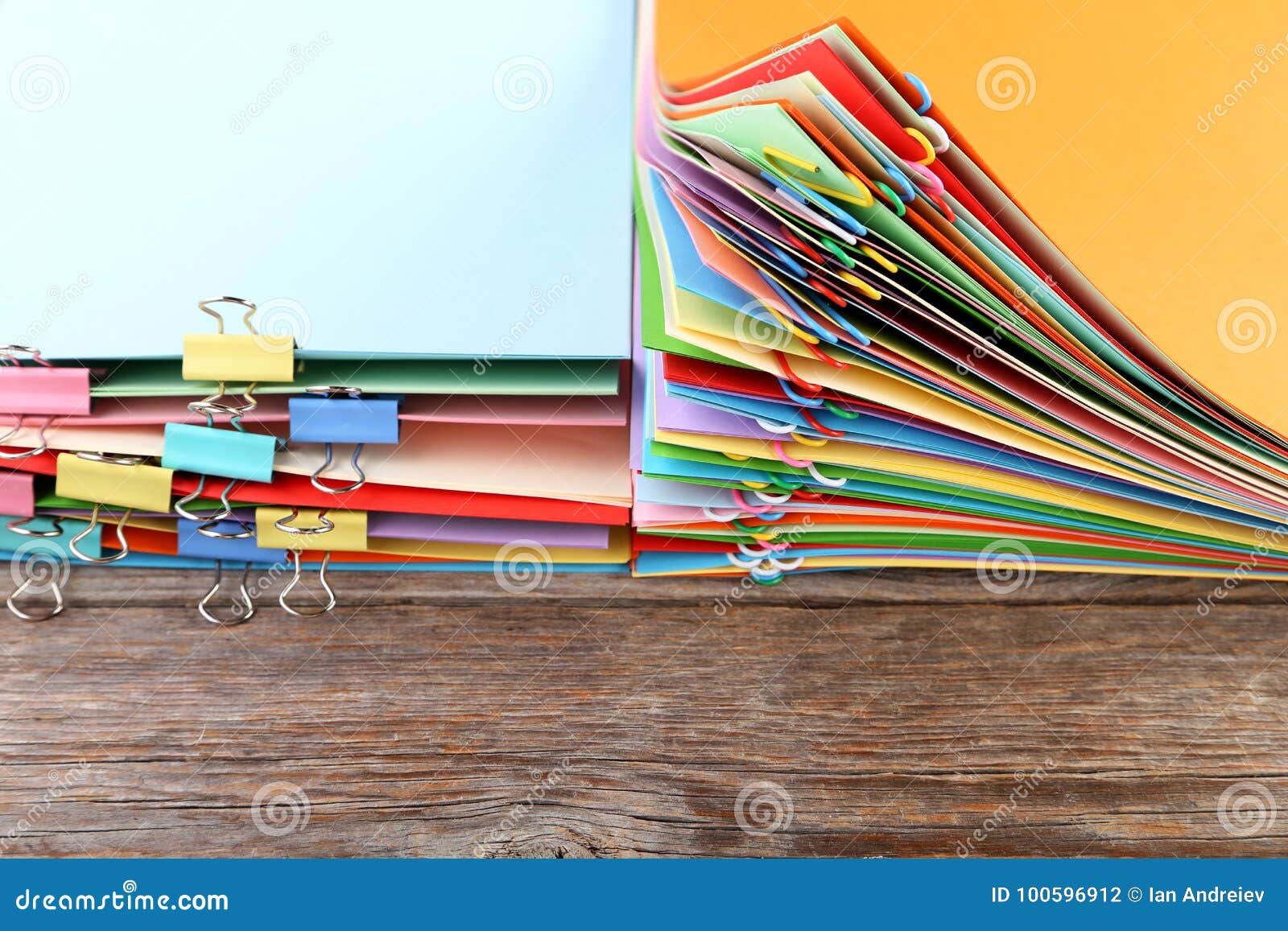 Papers with Paperclips and Clamps Stock Photo Image of color