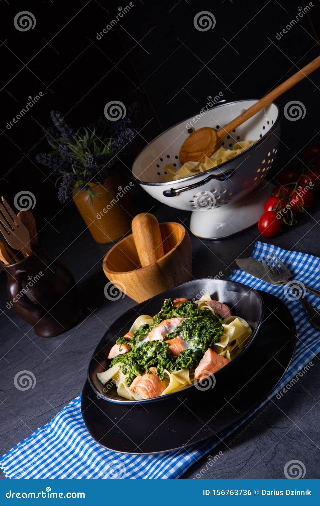 Pappardelle Pasta with Creamed Spinach and Fried Salmon Stock Photo