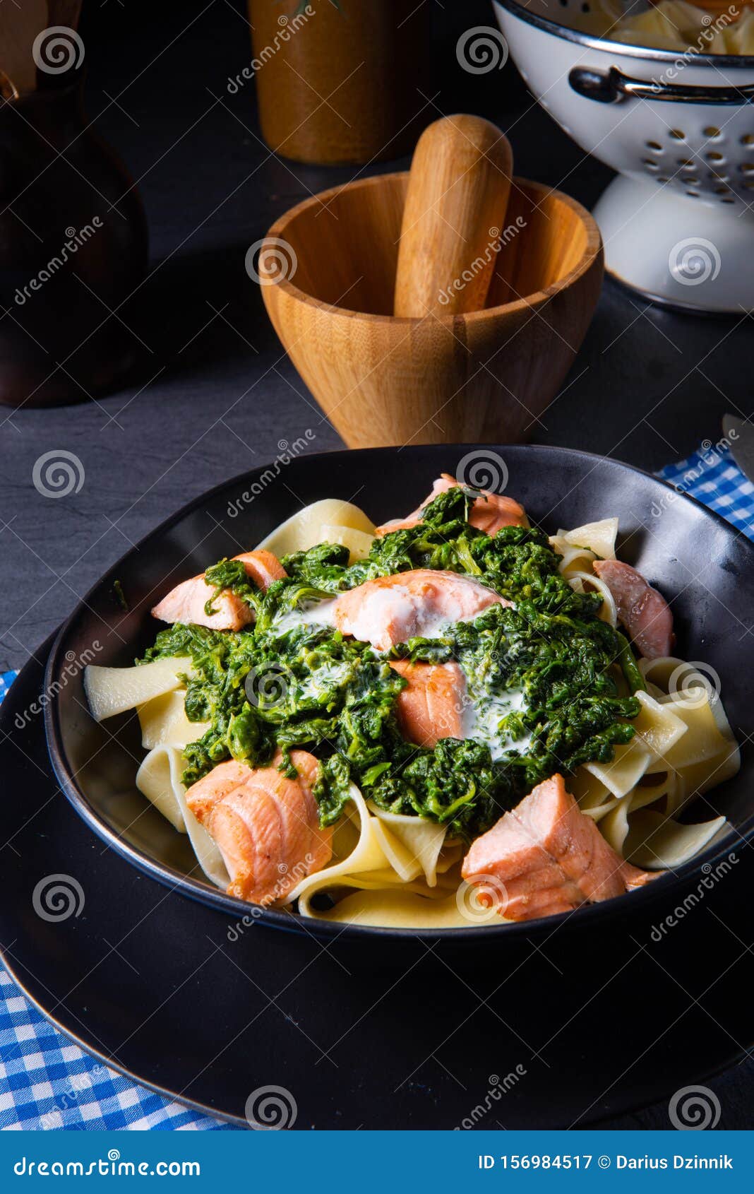 Pappardelle Pasta with Creamed Spinach and Fried Salmon Stock Image