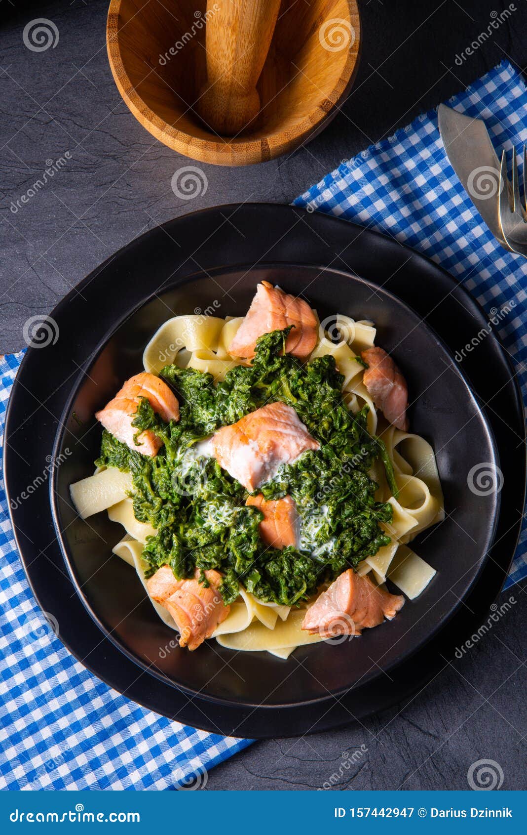 Pappardelle Pasta with Creamed Spinach and Fried Salmon Stock Image