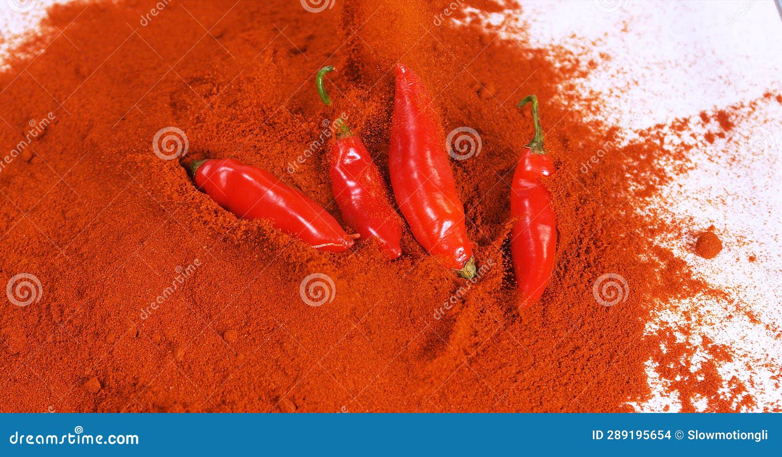 Paprika, Capsicum Annuum, Falling on Paprika Powder Stock Photo Image