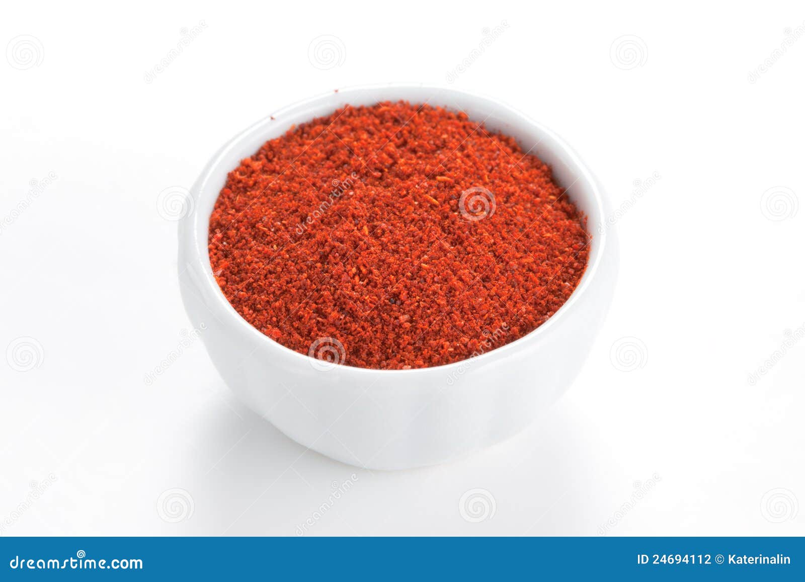 Paprika Ground in a Bowl on White Background. Stock Photo Image of