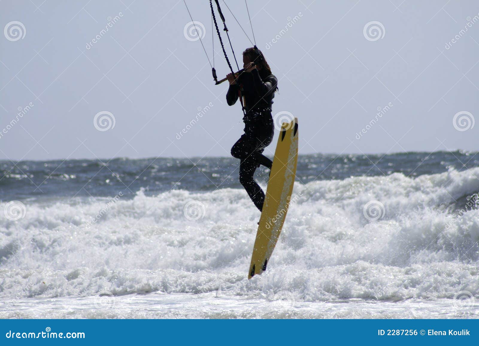 para-surfer above ocean