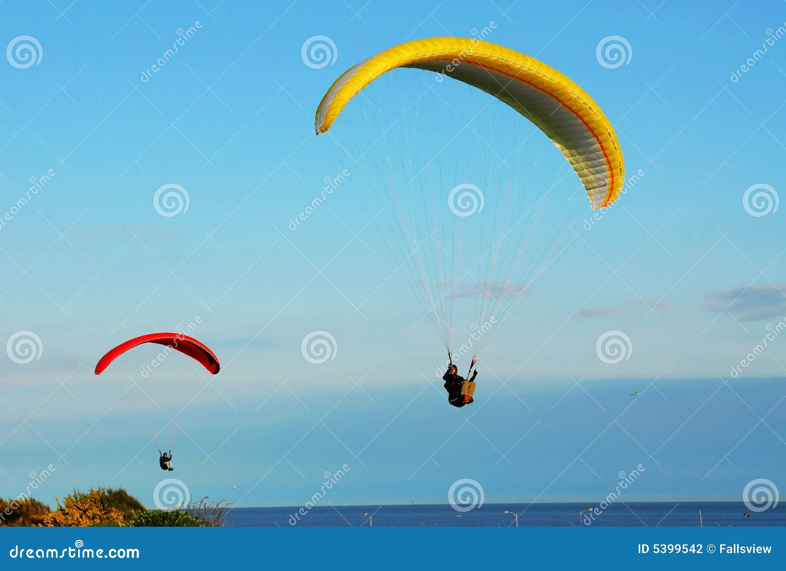 Parachute Flying Above the Ocean Stock Photo Image of parachute
