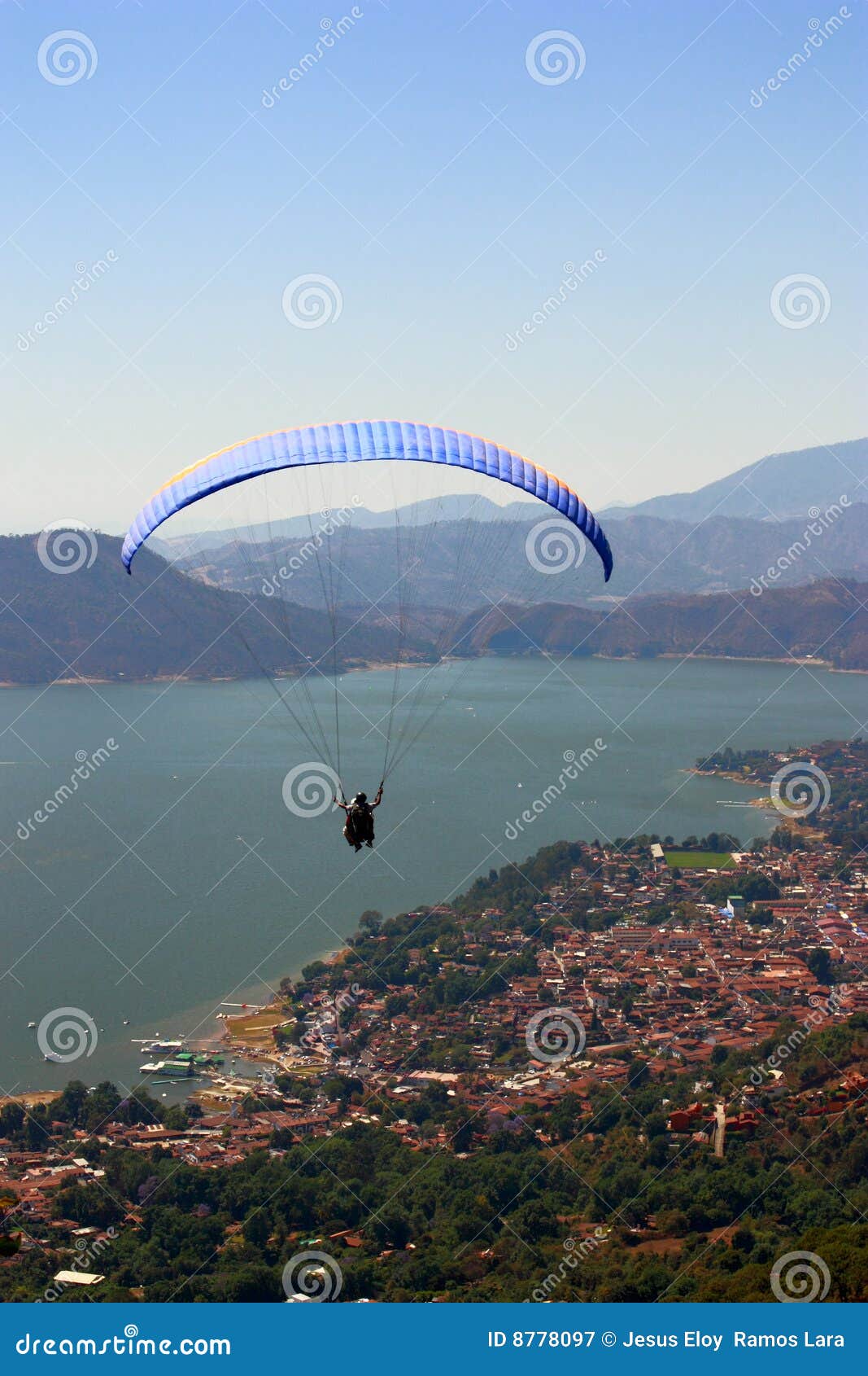 practicing paragliding over the lake of valle de bravo, mexico i