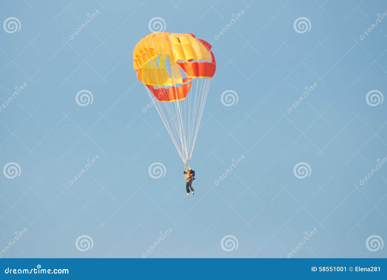 Parachutist In Bright Yellow Orange Parachute Parachute Stock Image