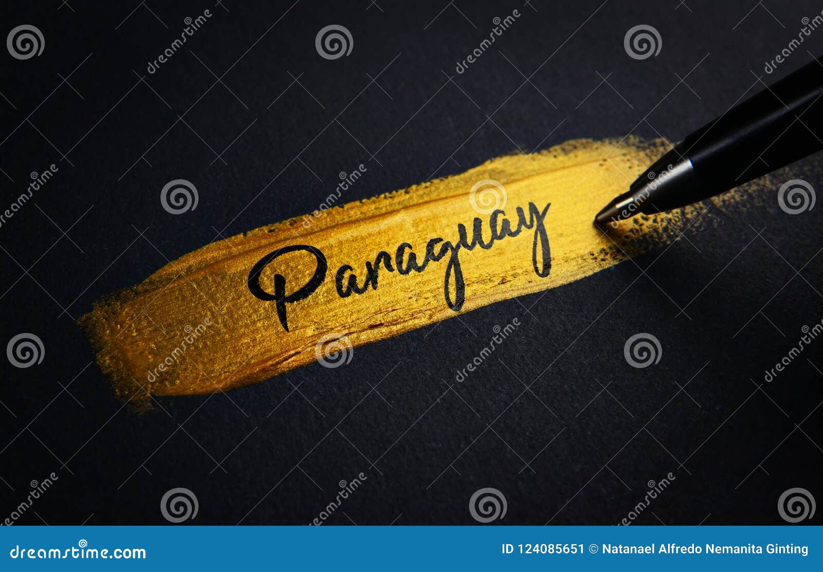 paraguay handwriting text on golden paint brush stroke