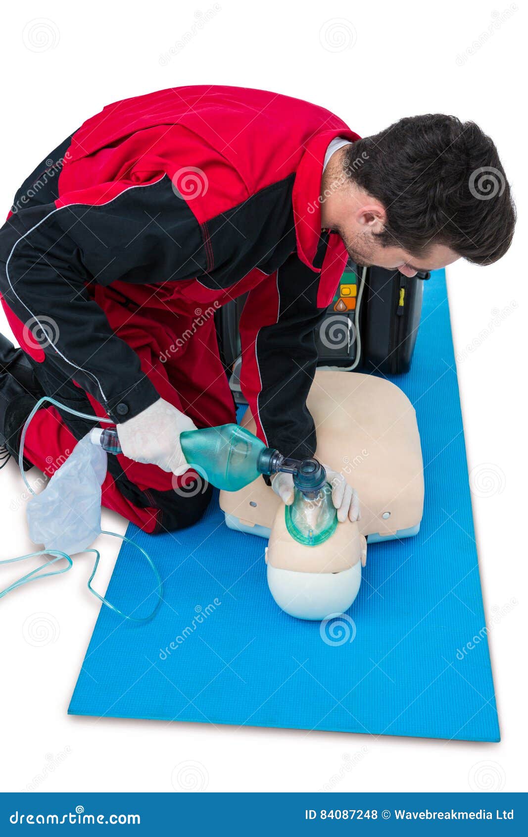 Paramedic Practicing Cardiopulmonary Resuscitation On Dummy Stock Photo