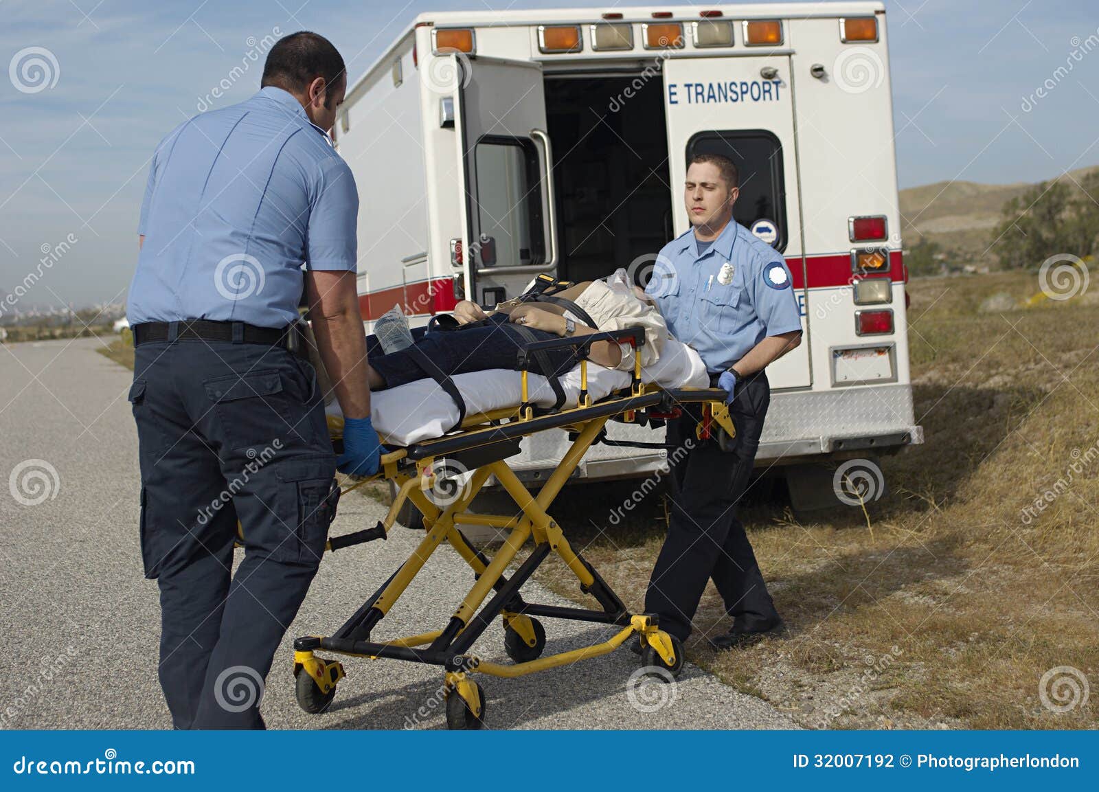 People Carrying Patient On Stretcher In Ambulance Royalty Free Stock people-carrying-patient-on-stretcher-in-ambulance-royalty-free-stock
