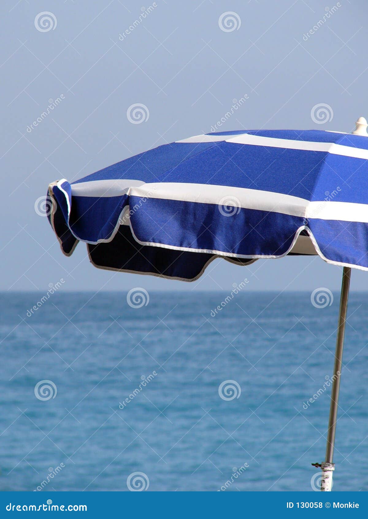 Parasol stock photo. Image of horizon, blue, stripes, parasol 130058