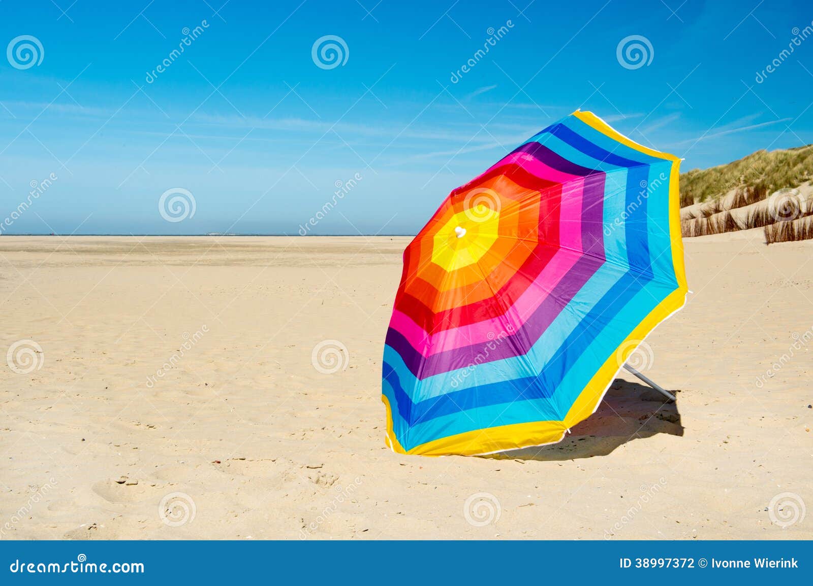 Parasol at the beach stock photo. Image of texel, sunshine - 38997372