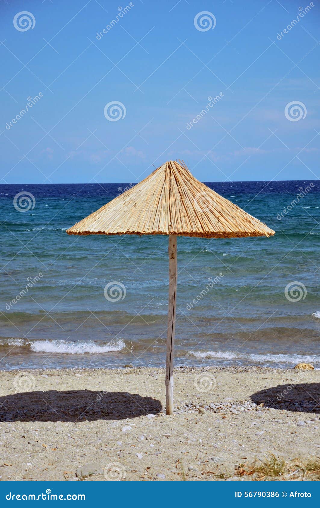 Parasol on the beach stock photo. Image of coolness, leisure 56790386