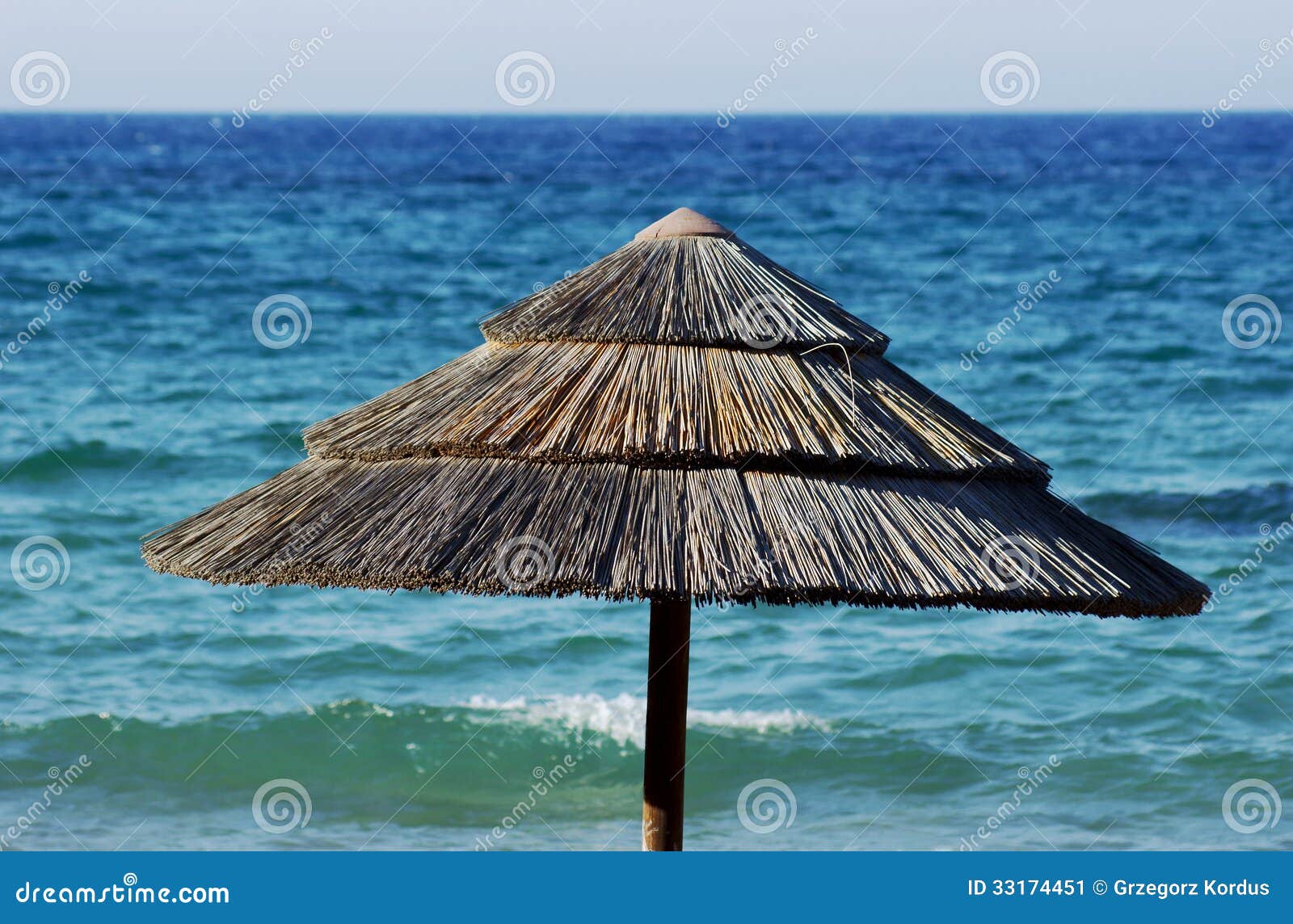 Parasol on the beach stock image. Image of sand, palm 33174451