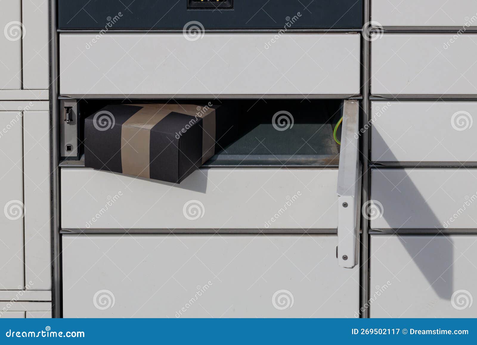 Parcel in the Automatic Mailbox Black Parcel in the Outbox