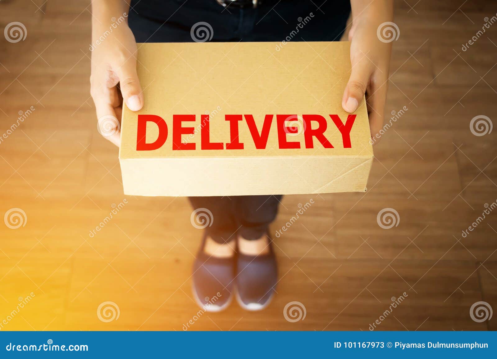 Parcel Package Delivery from Delivery Man , Anonymous Face Stock Image