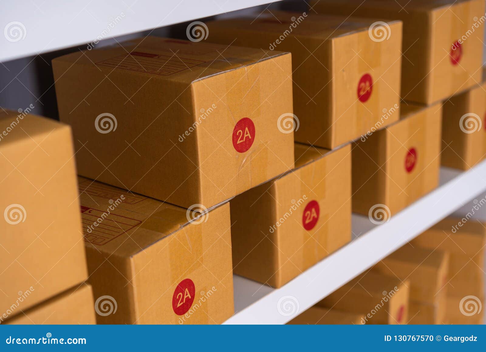 Parcels on Shelf Ready for Shipment To Client in Home Office Stock