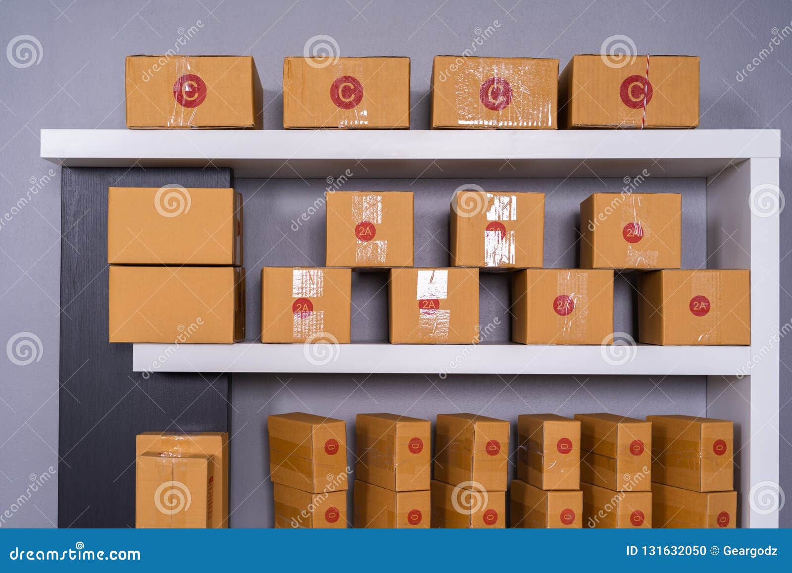 Parcels on Shelf Ready for Shipment To Client in Home Office Stock