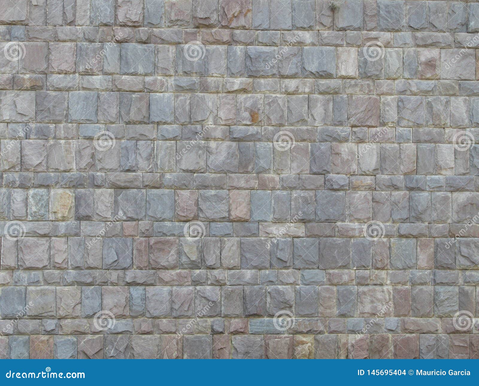 pared de bloques de piedras grises