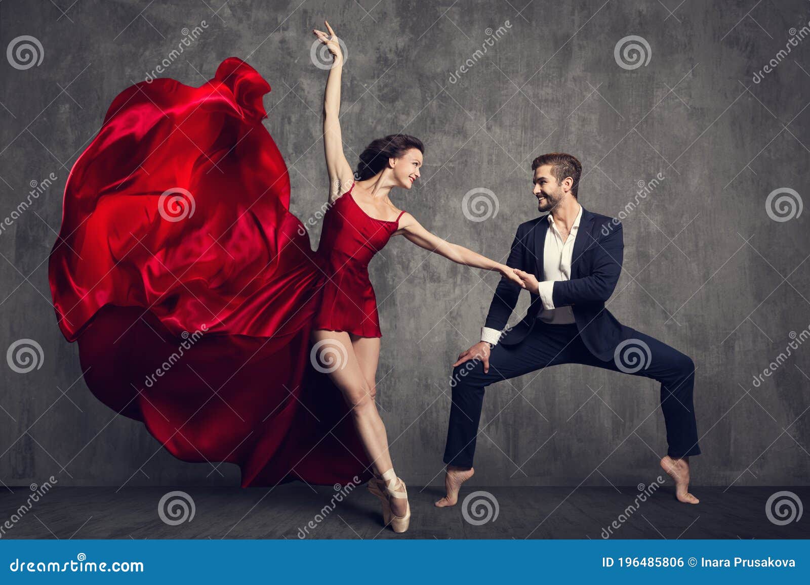 Pareja De Ballet Bailando, Mujer Hermosa Con Vestimenta Roja Y Hombre En  Traje, Bailarina Con Tejido Ondulado Foto de archivo - Imagen de gris,  flexible: 196485806