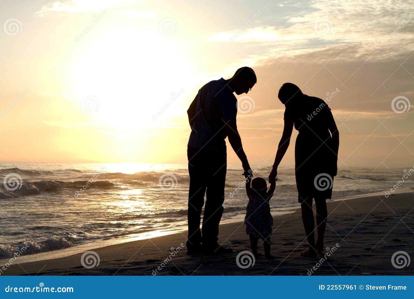 parents walking baby