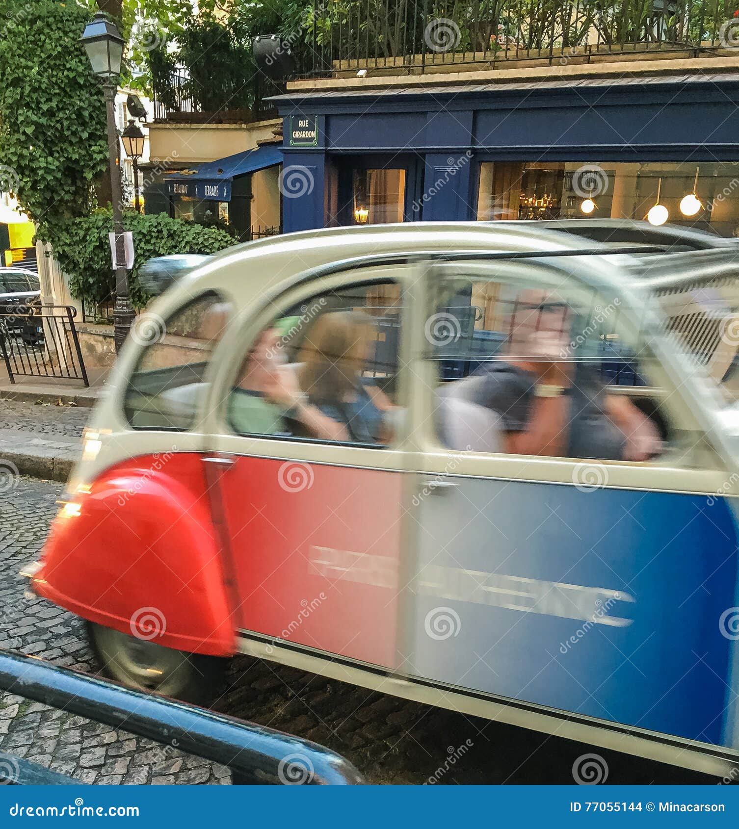 Paris Authentic Car Speeding by on Paris Street Editorial Stock Image