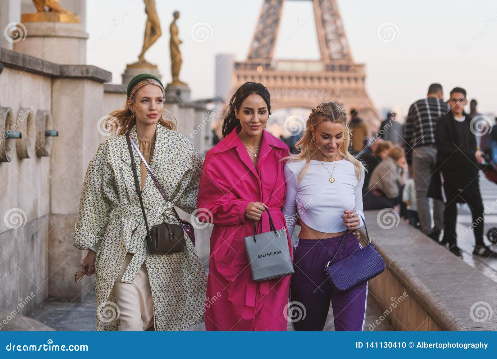 MILAN, ITALY - SEPTEMBER 21, 2019: Woman with beige dress and black leather Chanel  bag before Giorgio Armani fashion show, Milan Fashion Week street s Stock  Photo - Alamy