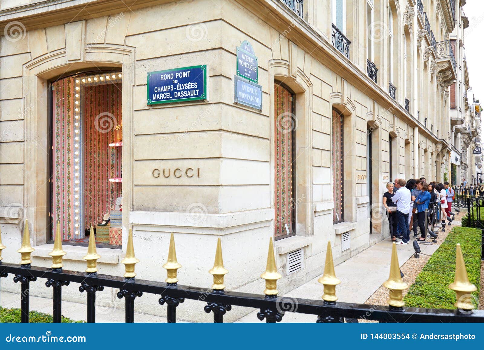 Gucci Fashion Luxury Store In Avenue Montaigne With People In Queue In Paris, France Editorial ...