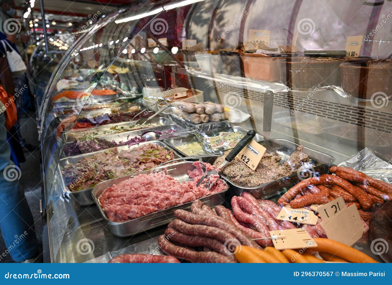 paris, france. june 30 2022. at the beautiful marchÃ¨ popincourt local market, a delicatessen counter with sausages, meat pie,