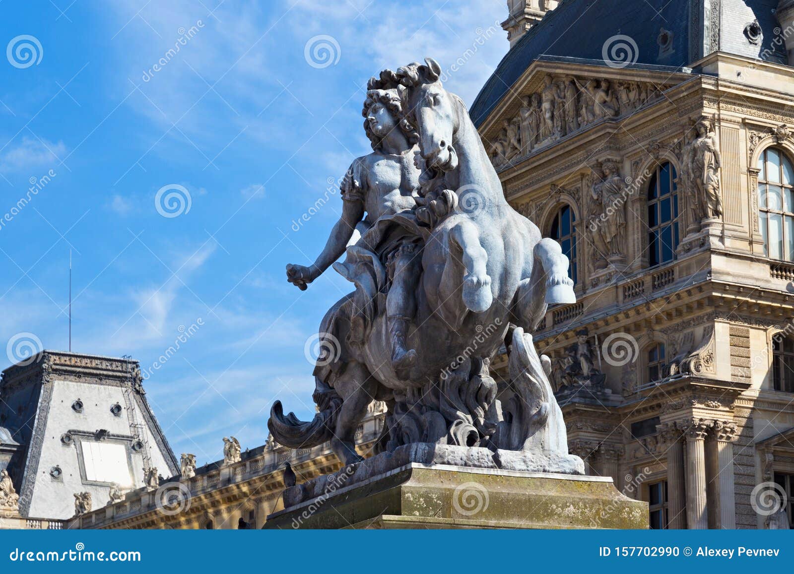 PARIS, FRANCE - JUNE 23, 2017: Sculpture Of The Louis XIV King Near The Louvre Buildings. Is The ...