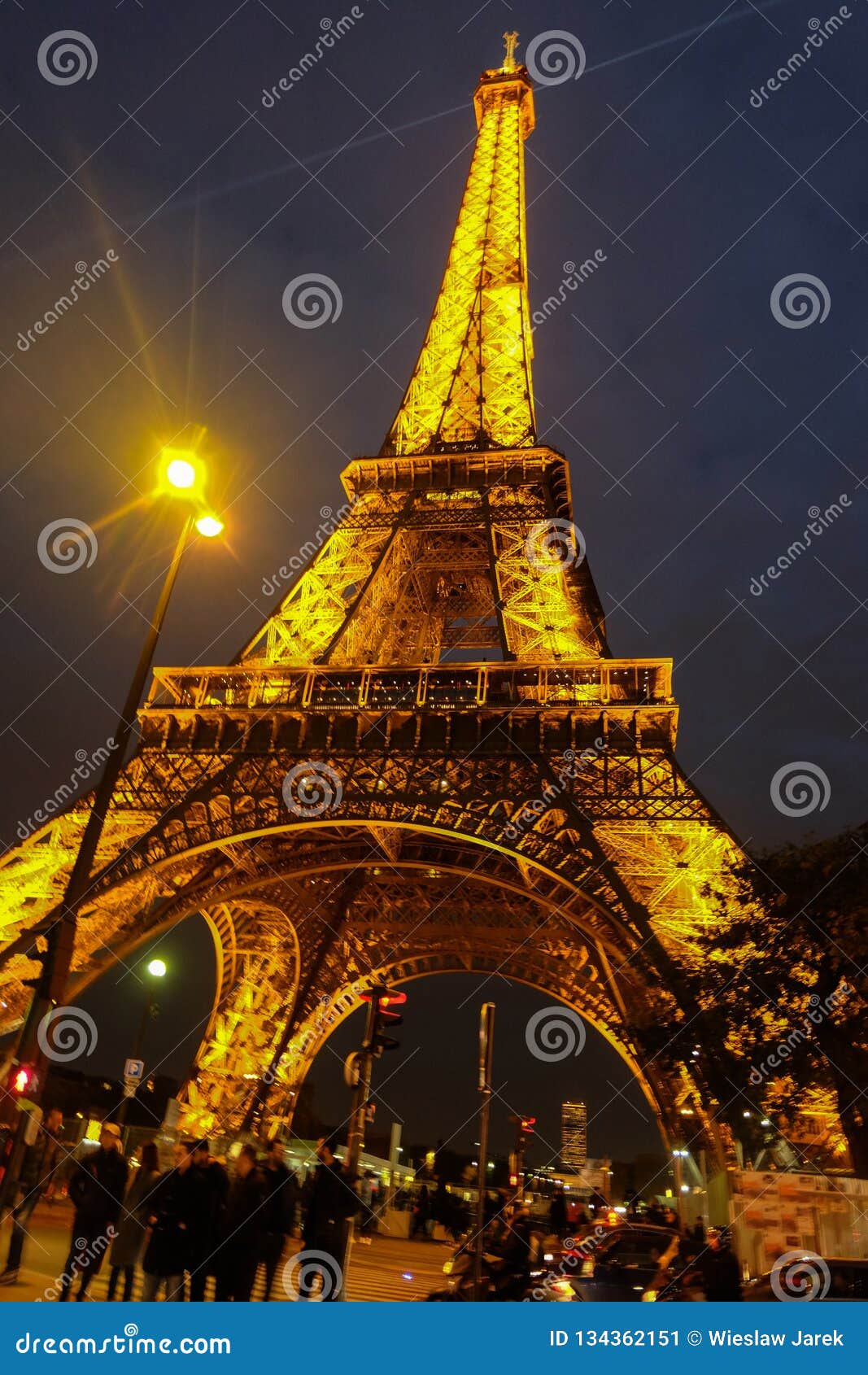 Eiffel Tower Illuminated At Dusk The Eiffel Tower Is One Of The Most