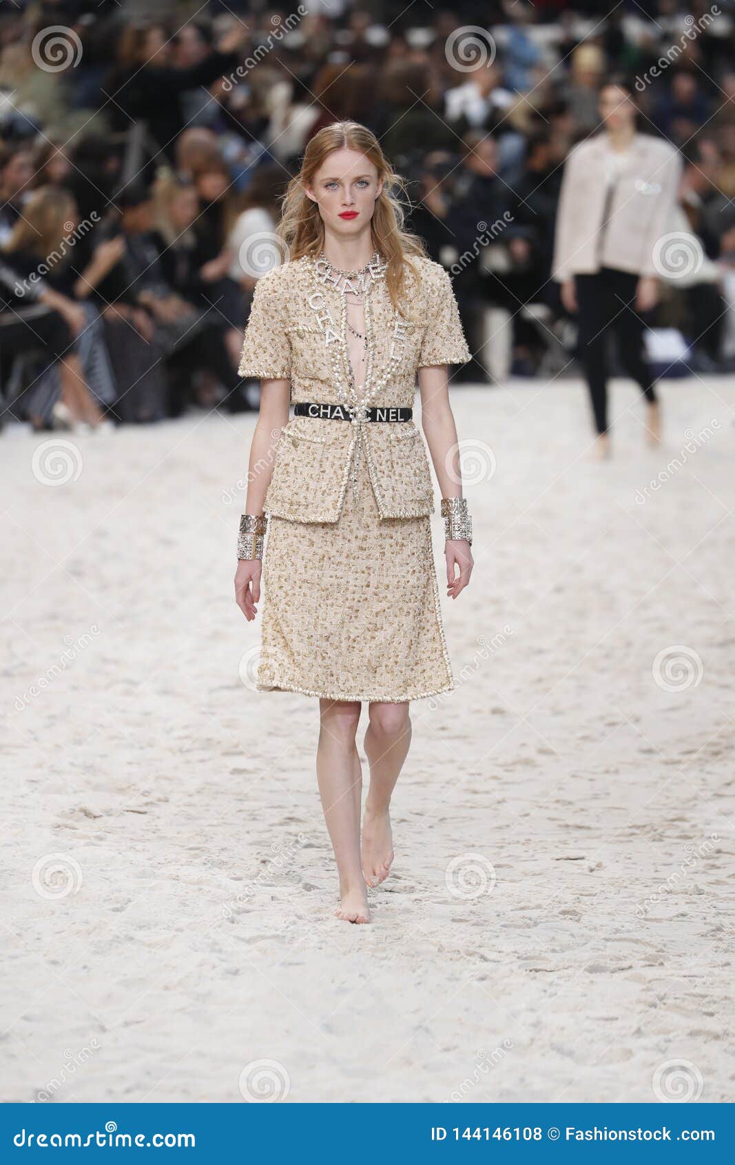 A model walks the runway during the Chanel Haute Couture show as part