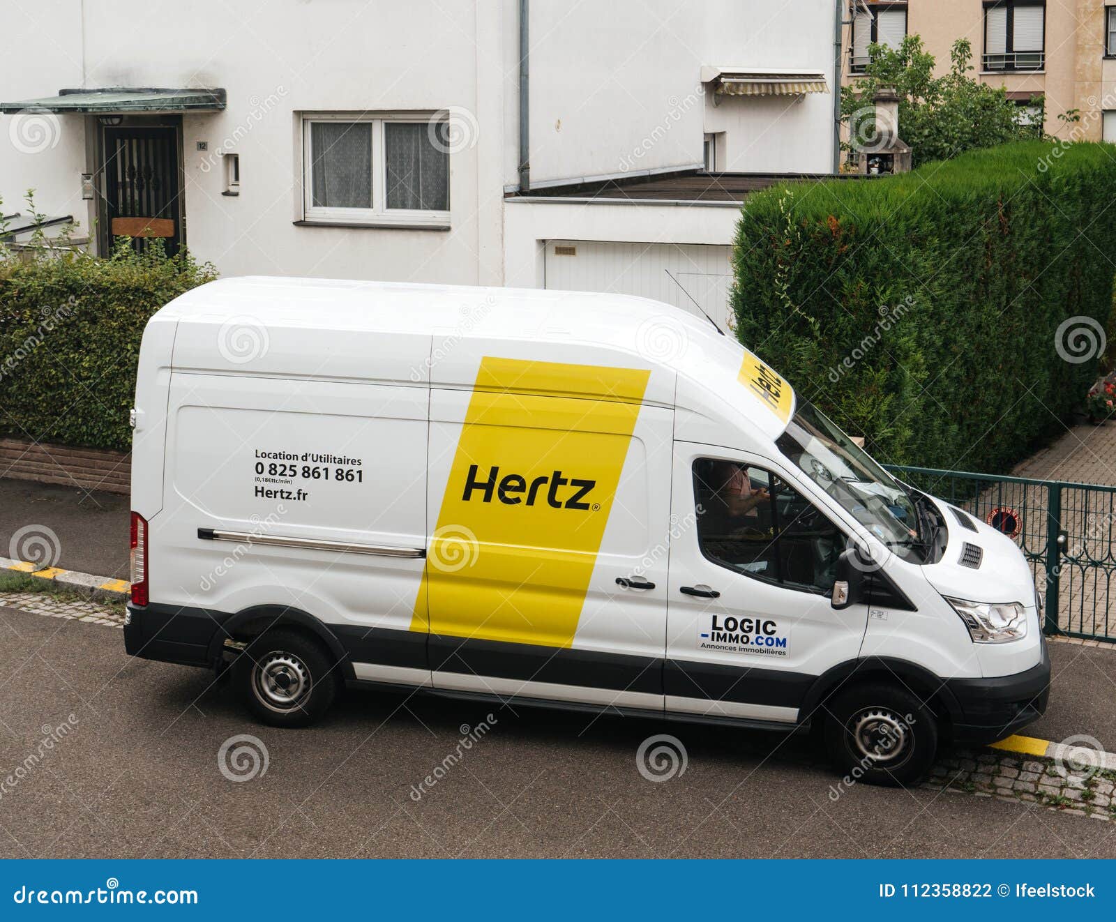 White HERTZ Rent A Van Service Seen 