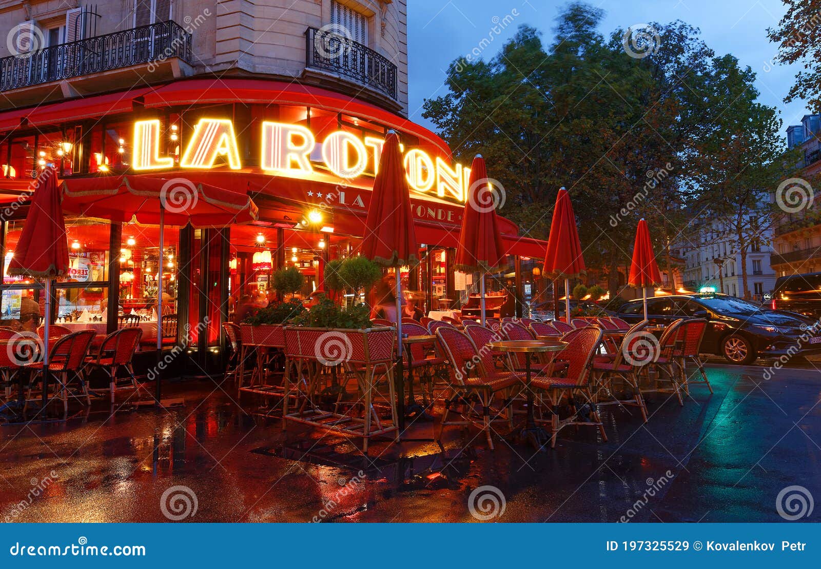 The Famous Cafe La Rotonde at Rainy Night , Paris, France Editorial ...
