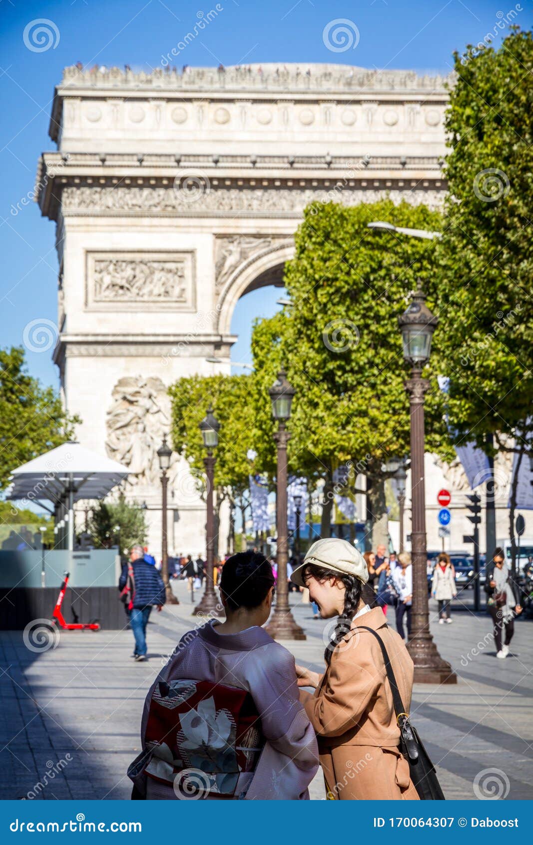 Paris - September 10, 2019 : Two Japanese Tourist Taking Pictures in