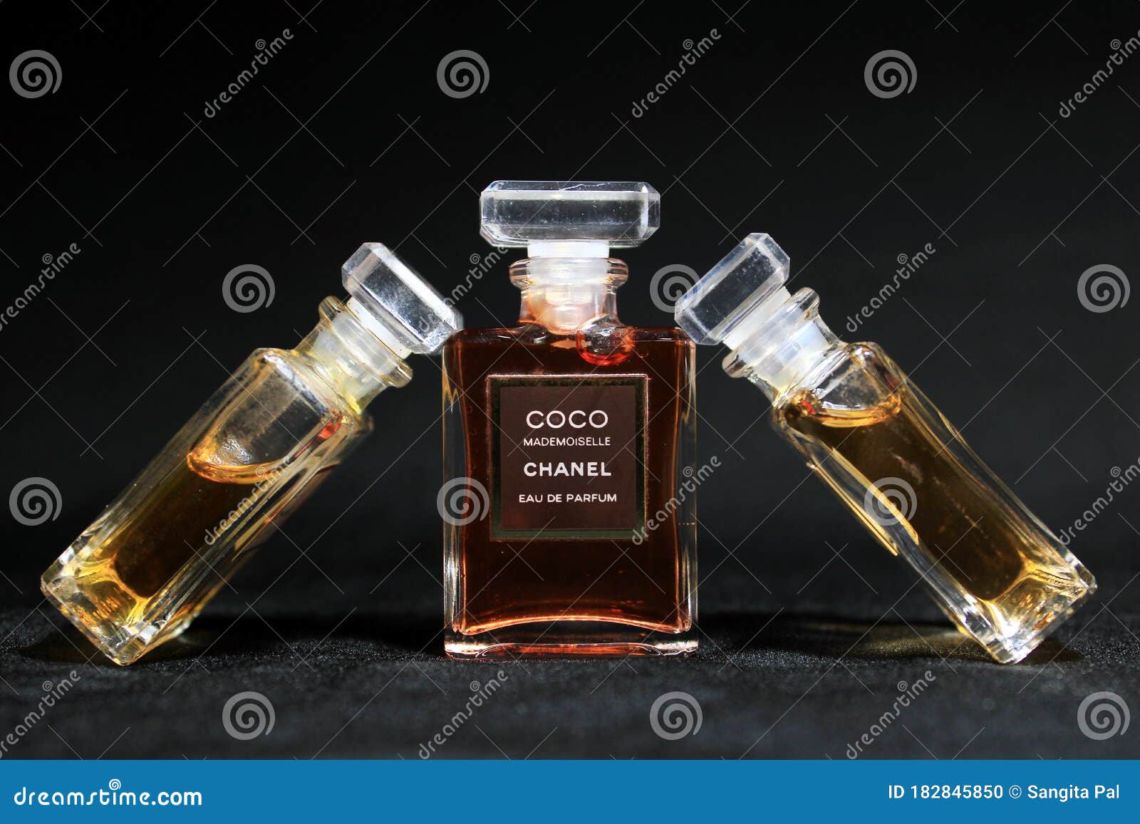 Chanel Perfume Bottles Isolated on Black Background. Bottles with