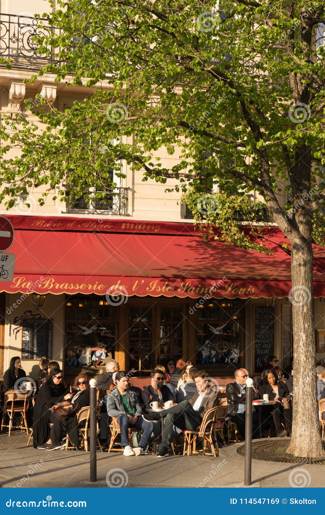 Parisians and Tourists Enjoy a Drink on a Terrace of Typical Paris ...