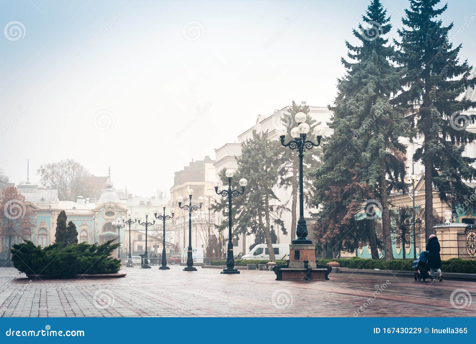 park alley with street lights in front of the mariinsky palace and the verkhovna rada, the supreme council of ukraine in kiev