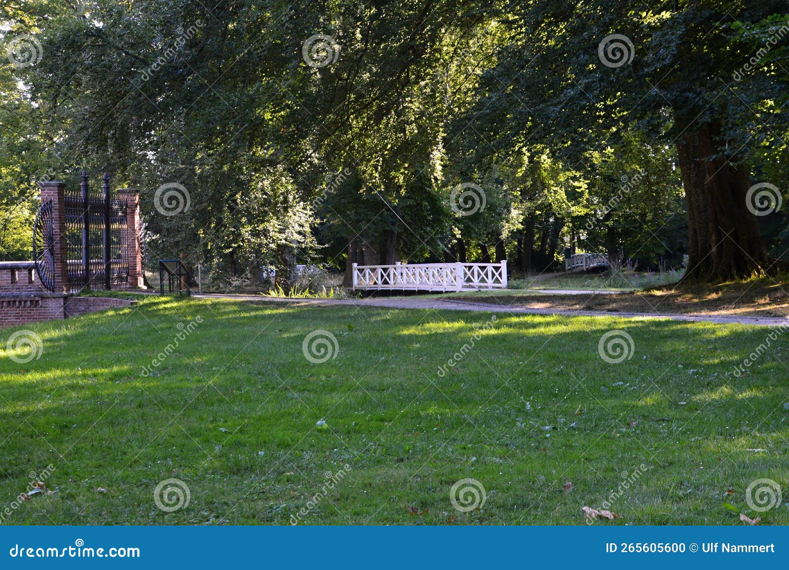 park at the historical castle evenburg in the town loga, leer, east frisia, lower saxony
