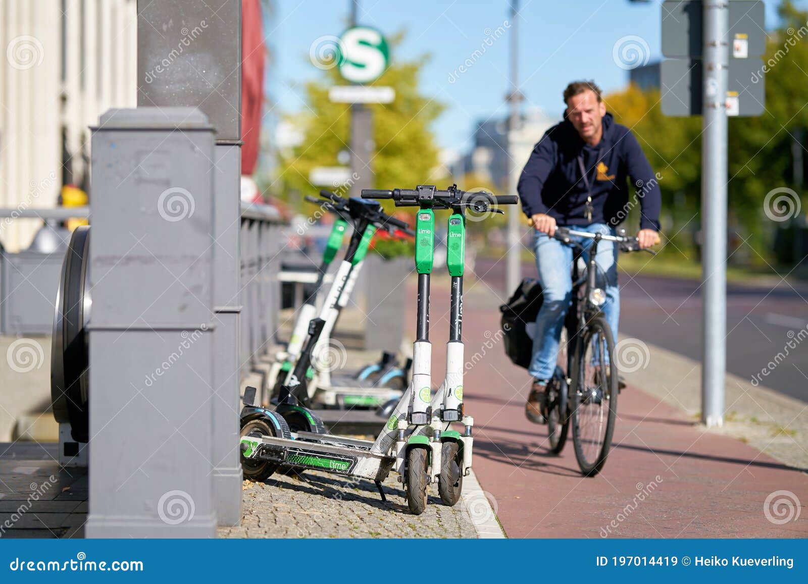Parked Escooters of the Lime Group in Berlin Editorial Stock Image