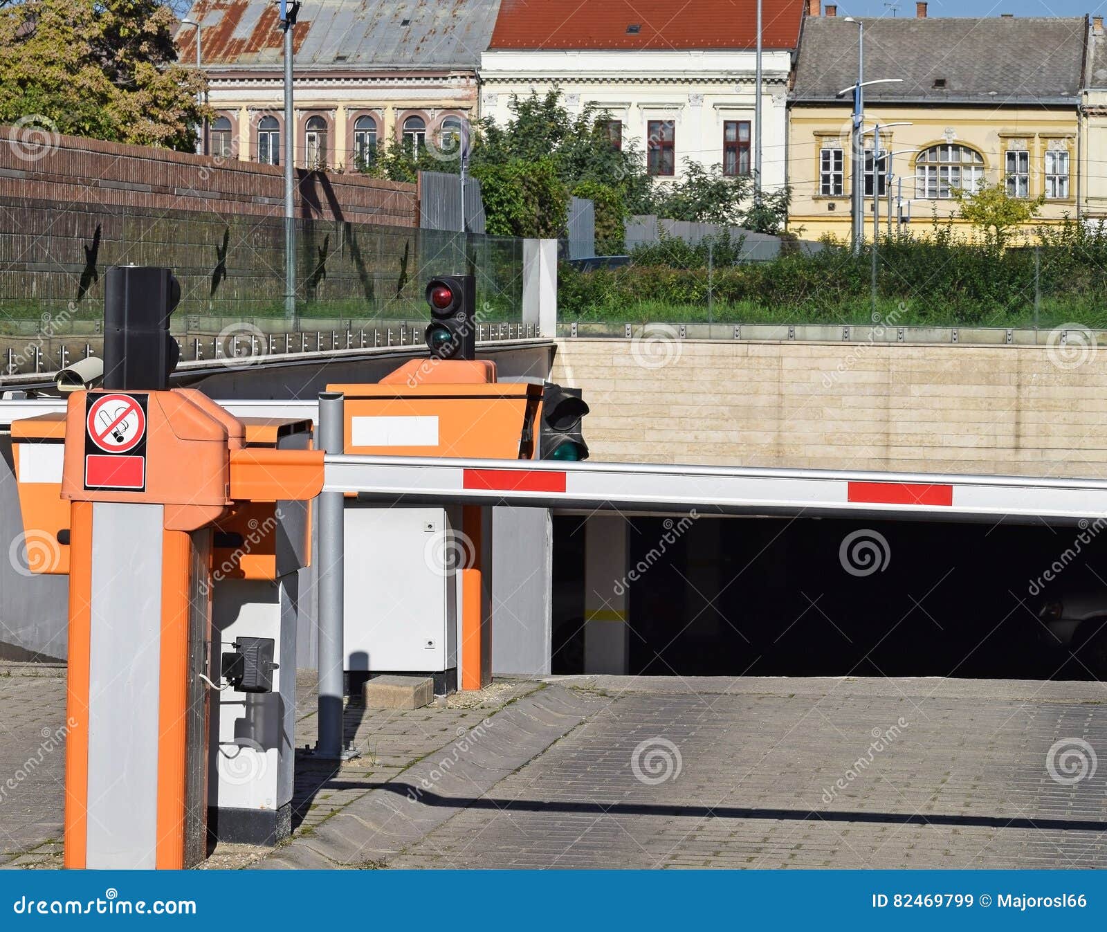 Parking lot gates stock image. Image of green, orange 82469799