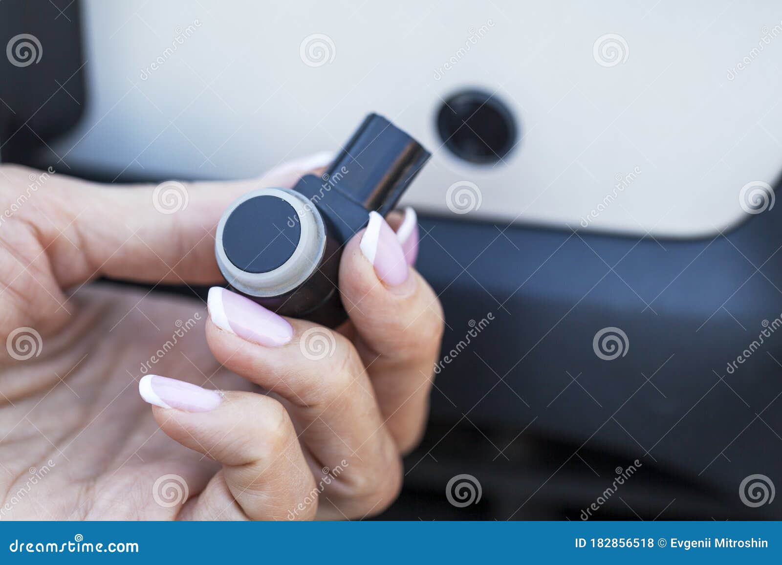 Parking Sensor Malfunction, a New Female Parking Sensor Stock Photo