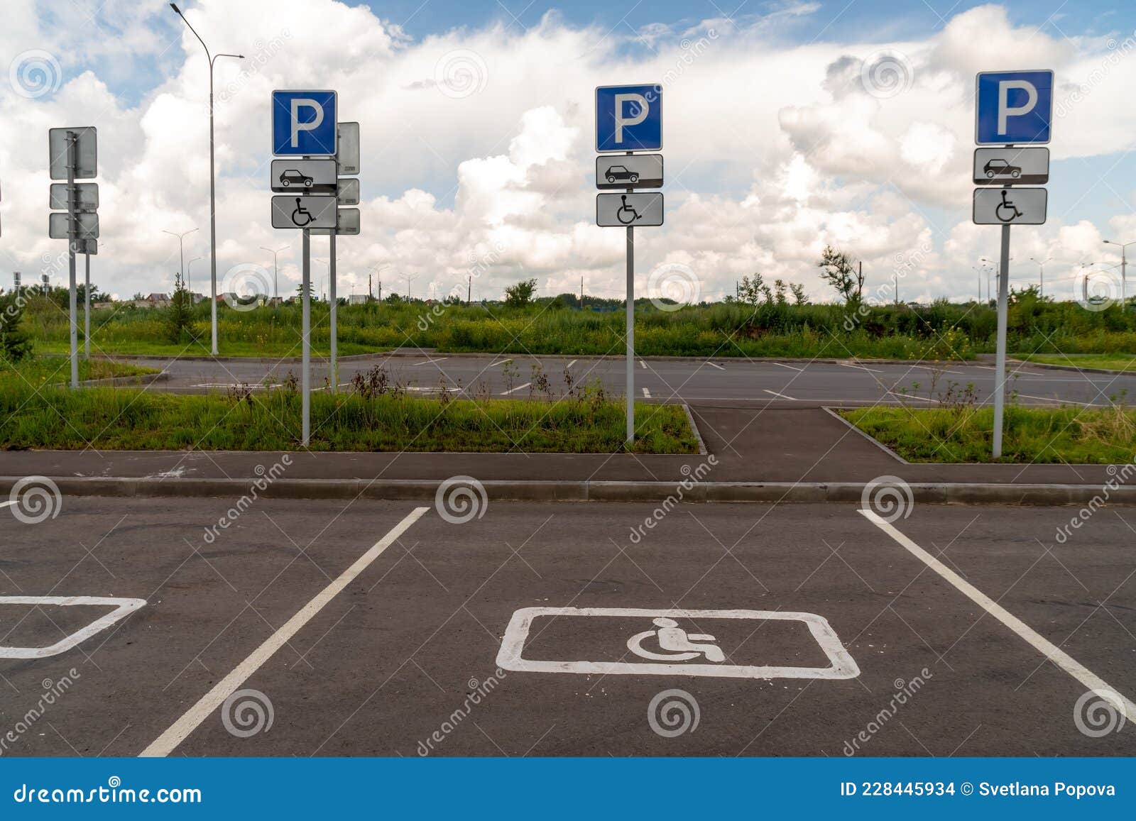 parking spaces for disabled people with road signs, demarcated on the asphalt