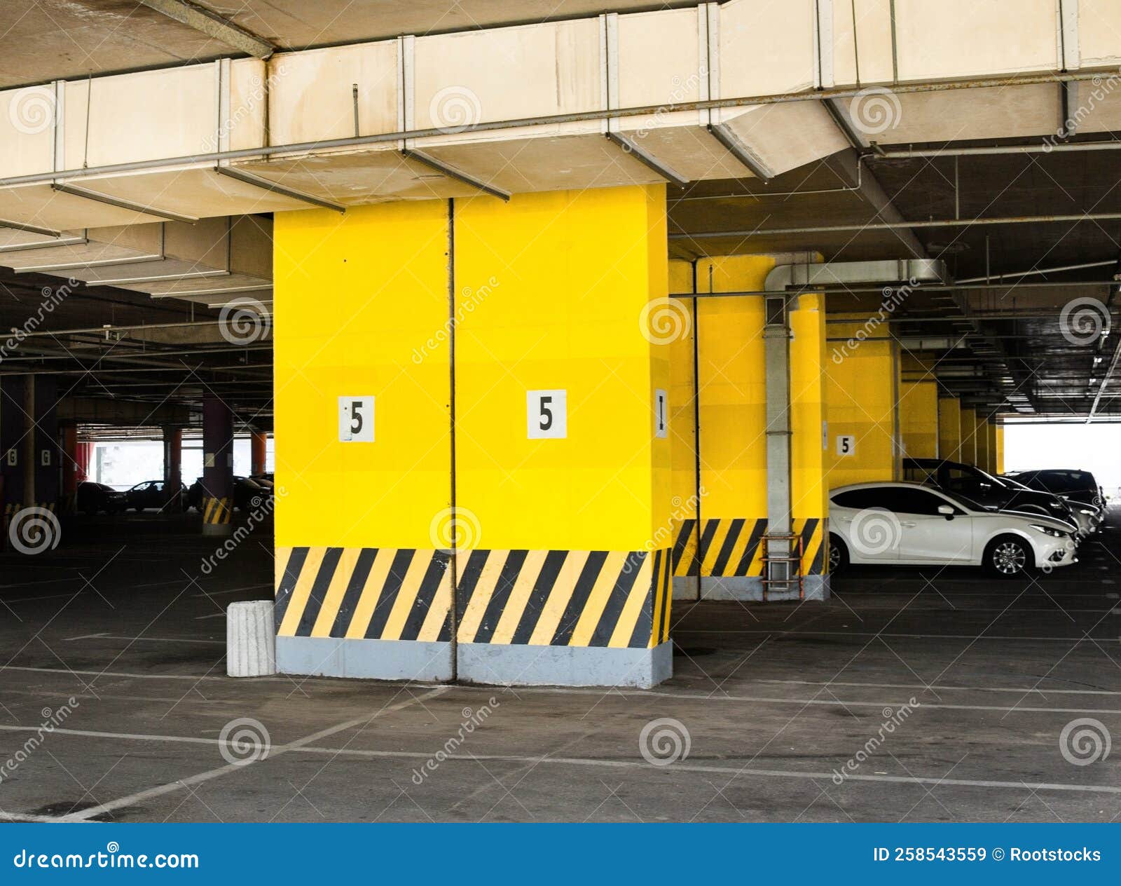 Parking under the building stock image. Image of industry 258543559