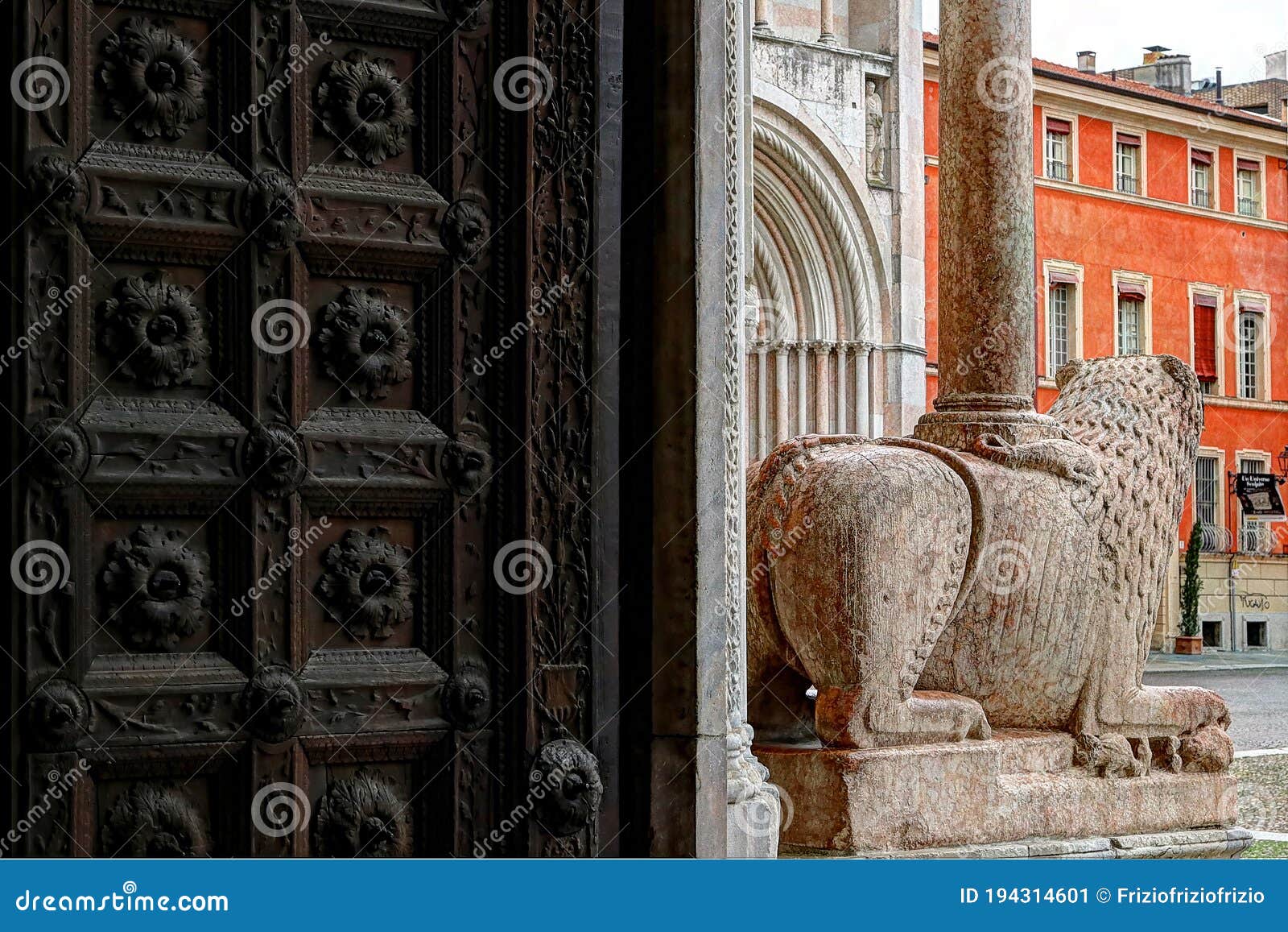 parma, detail of the entrance with ancien lion sculpture, romanic cathedral in the duomo square