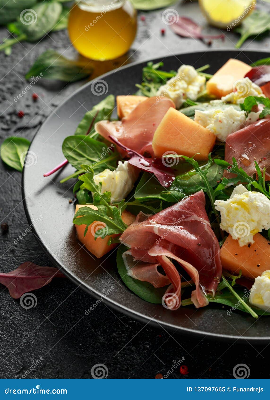 Parma Ham and Melon Salad with Mozzarella, Green Leaves Mix Stock Image